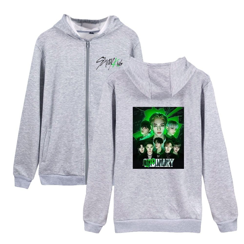 Hoodie featuring K-pop group promotional graphic with members' images and vibrant green accents. Perfect for K-pop fans and merchandise collectors.